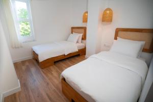 Letto o letti in una camera di Sadef Akkonak