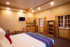 Una cocina o kitchenette en Mr. Tucan Hotel