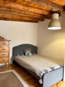 a bedroom with a bed and a wooden ceiling at Rosas märchenhafte Finca mit Pool in Vilaflor