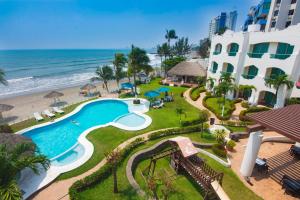 Bazén v ubytování Playa Caracol Hotel & Spa nebo v jeho okolí