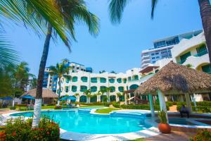 Bazén v ubytování Playa Caracol Hotel & Spa nebo v jeho okolí