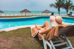 Bazén v ubytování Playa Caracol Hotel & Spa nebo v jeho okolí