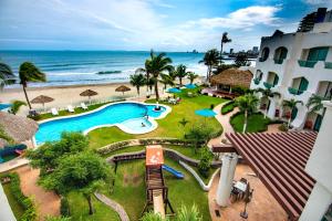 Bazén v ubytování Playa Caracol Hotel & Spa nebo v jeho okolí