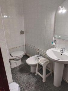 Koupelna v ubytování Hostal Residencia Pasaje + 7 fotografií