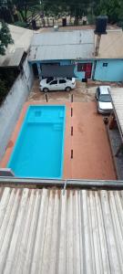 an overhead view of a swimming pool on a roof at jazmin apart iguazu in Puerto Iguazú