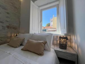 Ένα ή περισσότερα κρεβάτια σε δωμάτιο στο Aloha Pink House