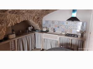 Η κουζίνα ή μικρή κουζίνα στο B&B Lo Scrigno della Taranta
