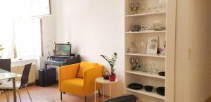 A seating area at ROOM 'Mozart' in a shared apartment