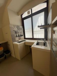 Køkken eller tekøkken på Ursino house