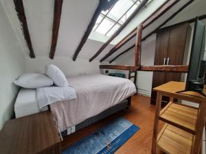 Postel nebo postele na pokoji v ubytování La Casa de Laura - Plaza