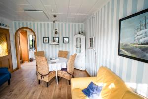 Posezení v ubytování Haus Leysand - Ostfriesische Gemütlichkeit