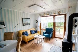 Posezení v ubytování Haus Leysand - Ostfriesische Gemütlichkeit