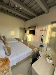 Postel nebo postele na pokoji v ubytování Hotel Med Llanogrande + 37 fotografií