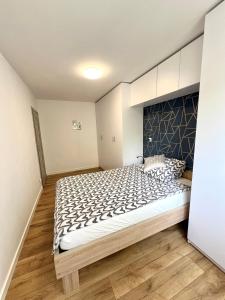 Postel nebo postele na pokoji v ubytování Apartament Gallusa