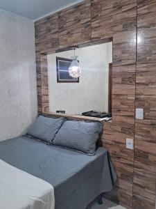 Postel nebo postele na pokoji v ubytování flat do anderson morro de são paulo
