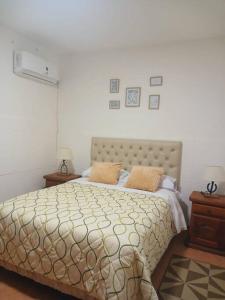 Postel nebo postele na pokoji v ubytování Departamento Temporario A&J