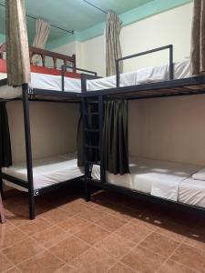 Postel nebo postele na pokoji v ubytování Candileja hostel