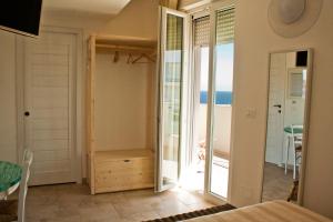 Postel nebo postele na pokoji v ubytování B&B Alalama