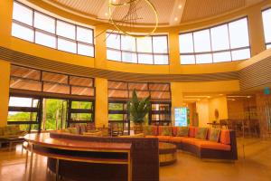 Seating area sa PICO DE LORO Nearest to Pool JACANA Studio Units by SEE Condominiums