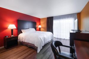 Postel nebo postele na pokoji v ubytování Pullman Garden Inn
