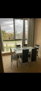 Χώρος καθιστικού στο Appartement au coeur de Marrakech avec deux piscines et une charmante vue