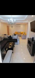 Χώρος καθιστικού στο Appartement au coeur de Marrakech avec deux piscines et une charmante vue +30 φωτογραφίες
