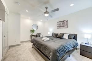 a bedroom with a bed and a ceiling fan at Perfect Stay King bed Free Parking Free Wi-Fi in Houston