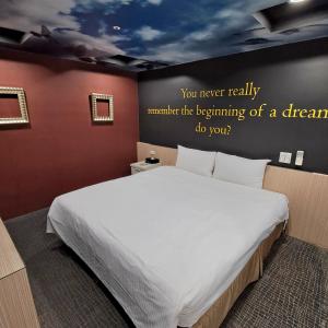 Ένα ή περισσότερα κρεβάτια σε δωμάτιο στο Morwing Hotel Fuzhong