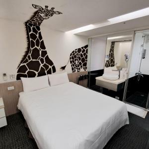 Ένα ή περισσότερα κρεβάτια σε δωμάτιο στο Morwing Hotel Fuzhong