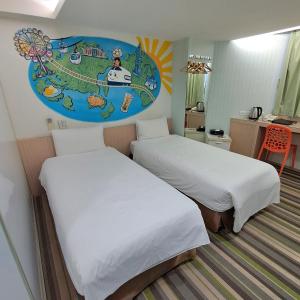 Ένα ή περισσότερα κρεβάτια σε δωμάτιο στο Morwing Hotel Fuzhong