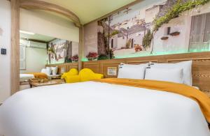 Postel nebo postele na pokoji v ubytování Soop Hotel
