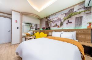 Postel nebo postele na pokoji v ubytování Soop Hotel