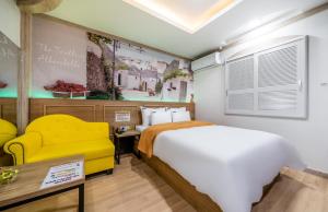 Postel nebo postele na pokoji v ubytování Soop Hotel