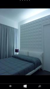 Postel nebo postele na pokoji v ubytování B&B Numero Uno