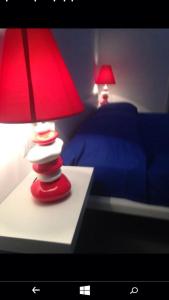 Postel nebo postele na pokoji v ubytování B&B Numero Uno