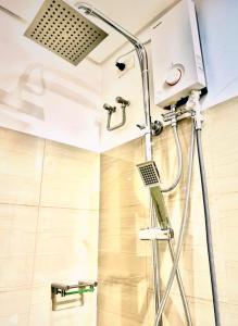 Ванна кімната в Hotel-Like Staycation2 MOA Pasay
