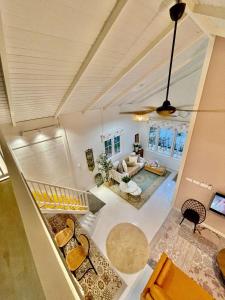 an aerial view of a living room with a couch at Rumah Kebun, Jerteh Besut in Kampung Dengir +18 photos