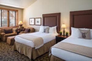 Ένα ή περισσότερα κρεβάτια σε δωμάτιο στο The Hotel Telluride