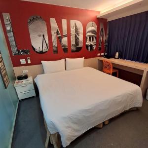 Voodi või voodid majutusasutuse Morwing Hotel Fuzhong toas