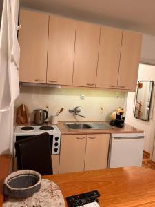 A kitchen or kitchenette at Cozy with parking Még 19 kép