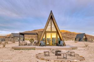 a small house in the middle of the desert at Stardust Big Bend Luxury A-Frame#1 with a fab view in Terlingua