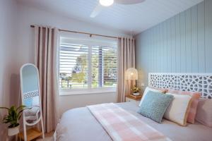 Postel nebo postele na pokoji v ubytování Beach Hut Scamander