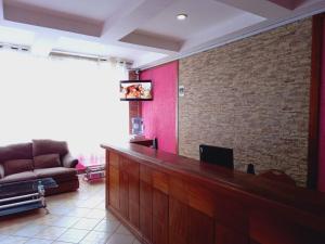 TV a/nebo společenská místnost v ubytování Fahari Bliss Hotel + 27 fotografií