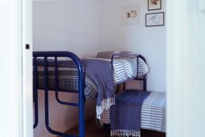 Postel nebo postele na pokoji v ubytování Beach Hut Scamander