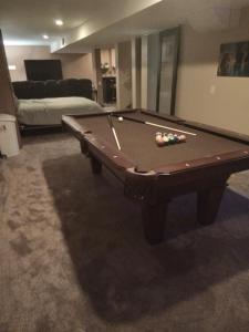 Stół bilardowy w obiekcie Super Suite with Sauna, Pool Table and Arcade Game