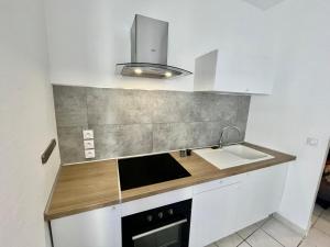Kuchyň nebo kuchyňský kout v ubytování Le Blue Bay + 2 fotografie