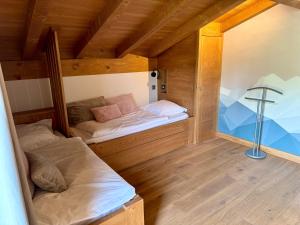 Postel nebo postele na pokoji v ubytování Chalet du Feug