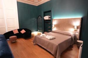 Postel nebo postele na pokoji v ubytování Suite Gimma 209
