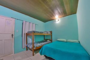 a bedroom with a bed and a wooden ceiling at CASA DE TEMPORADA RECANTO FELIz 2 in Aracaju +43 photos