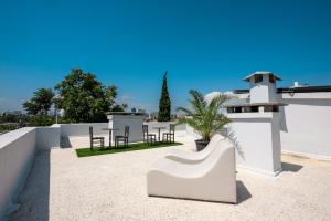 a patio on the roof of a house at Delight Deluxe Port in Antalya